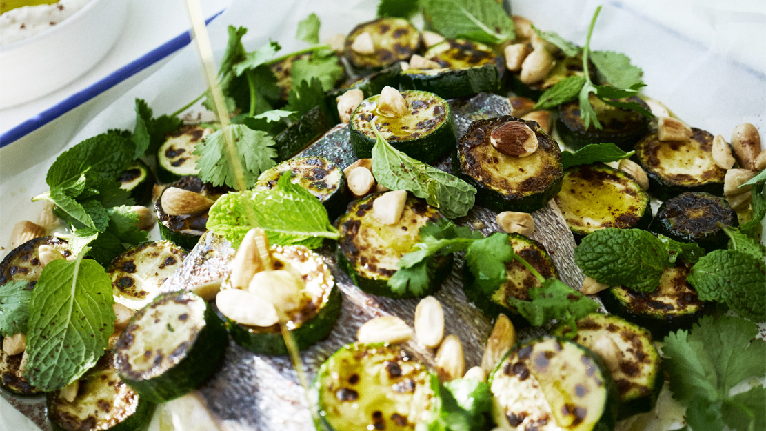 Baked snapper, tahini yoghurt, zucchini and almonds
